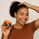Happy woman styling her natural hair with Shine 'n Jam Conditioning Gel Supreme Hold, showing smooth edges and a sleek finish – perfect for natural hair care in South Africa.